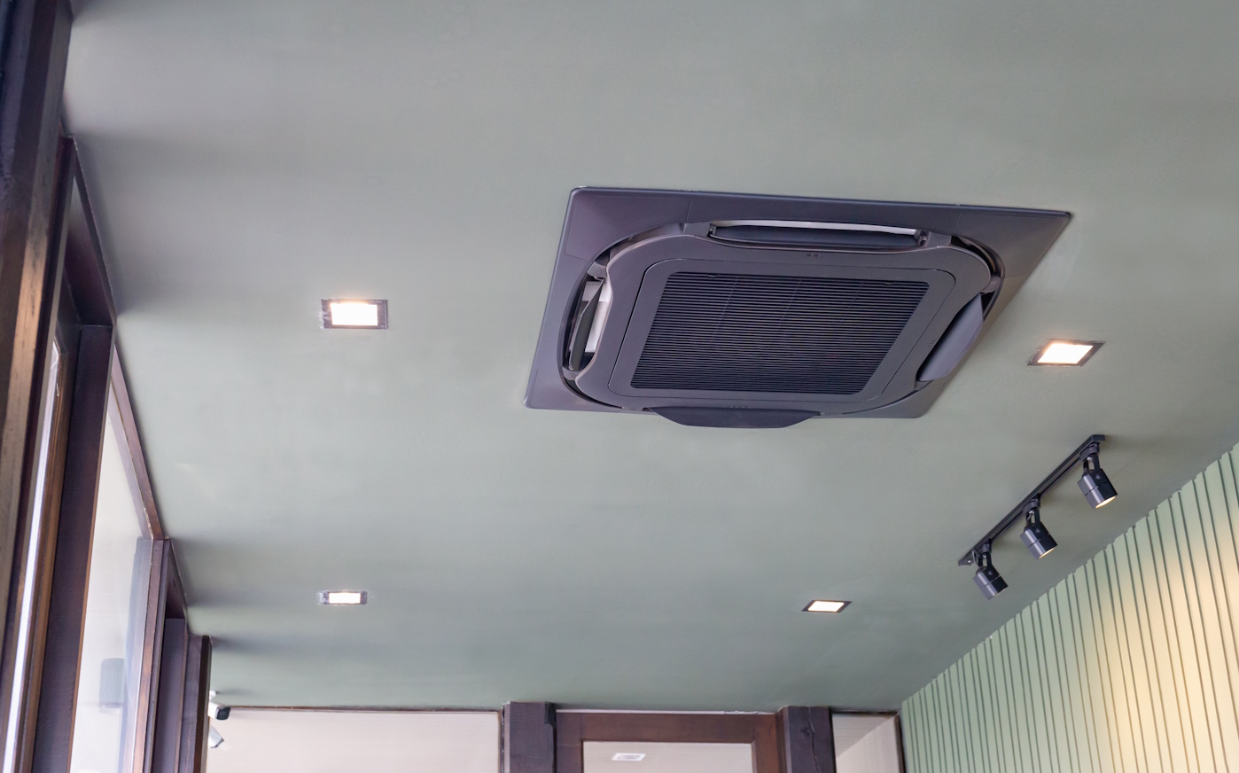 ceiling cassette air conditioning unit installed in a shop